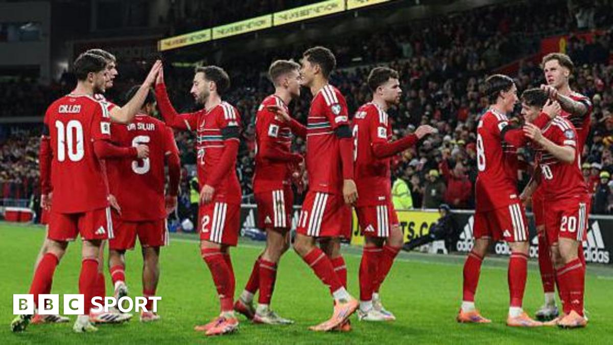 Wales players celebrate Dan James' goal