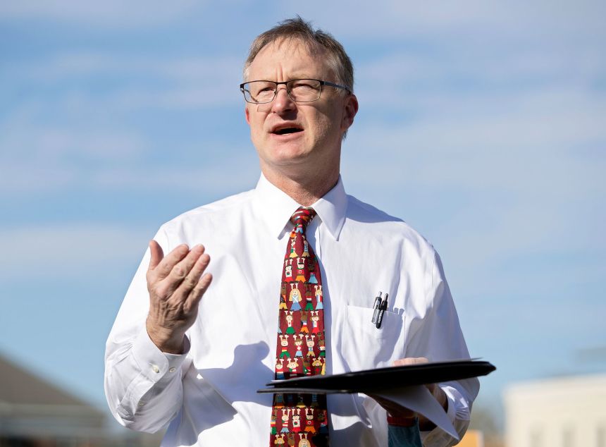 Mark Downey speaks during a rally for an economic recovery and infrastructure package prioritizing climate, care, jobs, and justice, in Williamsburg, Virginia, on April 3, 2021.