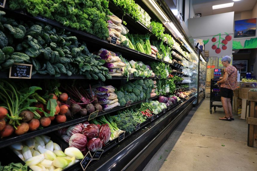 Vegetables are on display in a grocery store in Delray Beach, Florida, on August 15.