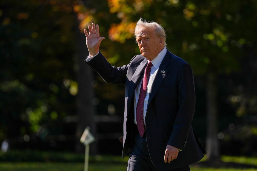 President Donald Trump waves as he walks towards Marine One on the South Lawn of the White House on November 5.