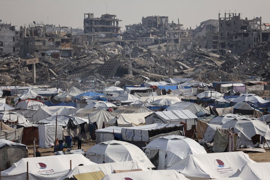 Displaced Palestinians living in makeshift tents in Zeitoun neighborhood of Gaza City on Monday.
