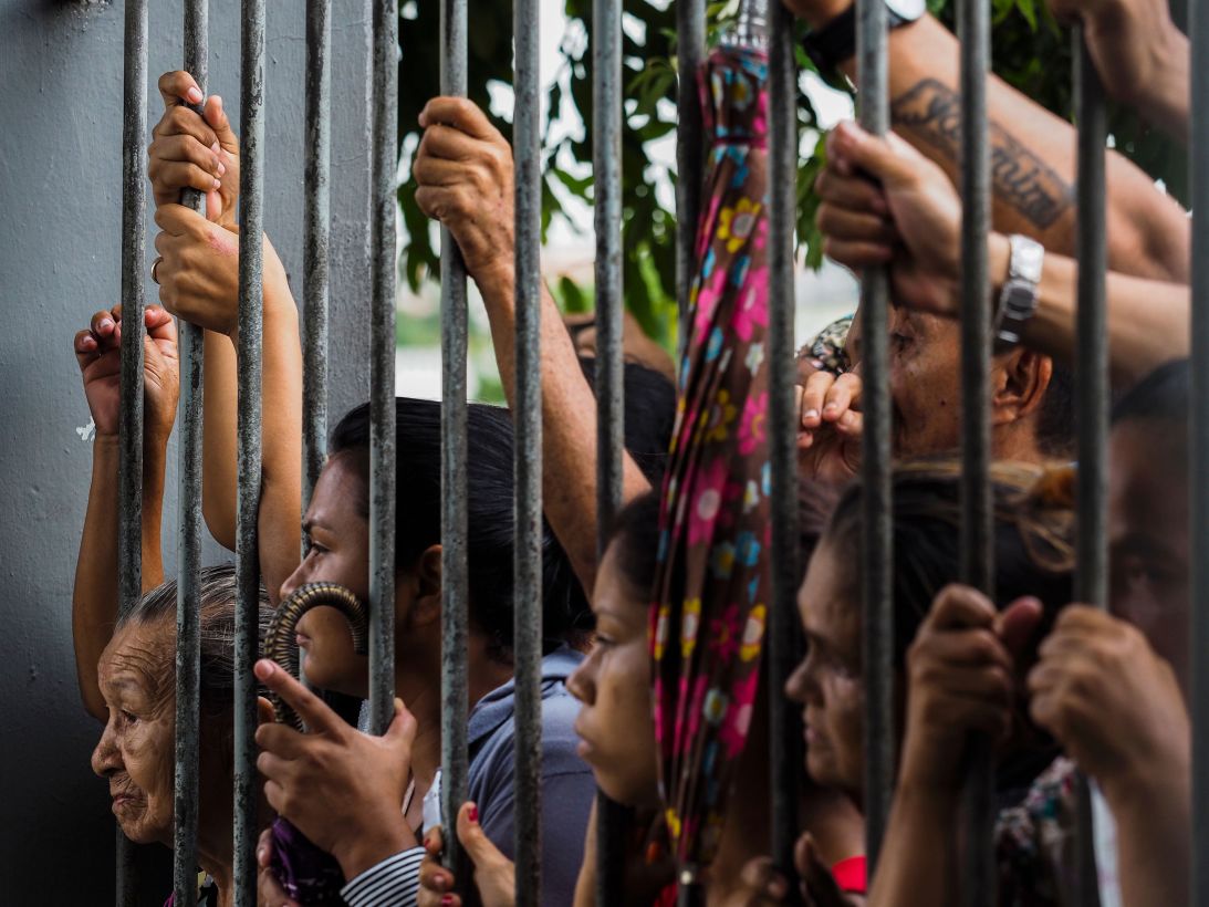 Relatives wait for information following a riot that ended with at least four prisoners killed inside Desembargador Raimundo Vidal Pessoa Public Jail in Manaus, in Brazil's Amazonas state, on January 8, 2017. Deadly prison riots intensified in Brazil since a truce broke down between the country's two largest drug gangs, the First Capital Command (PCC) and the Red Command (CV).