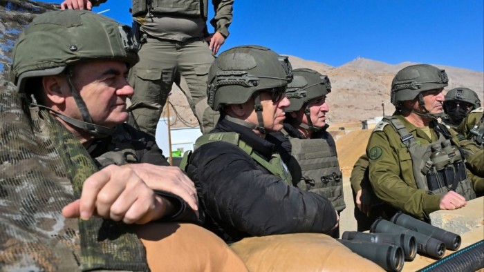 Prime Minister Benjamin Netanyahu, Defense Minister Israel Katz, Foreign Affairs Minister Gideon Sa'ar, and military officials in helmets and vests observe the buffer zone.