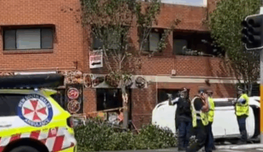 Three pedestrians fight for life after being hit by car outside Indian restaurant in Sydney's west