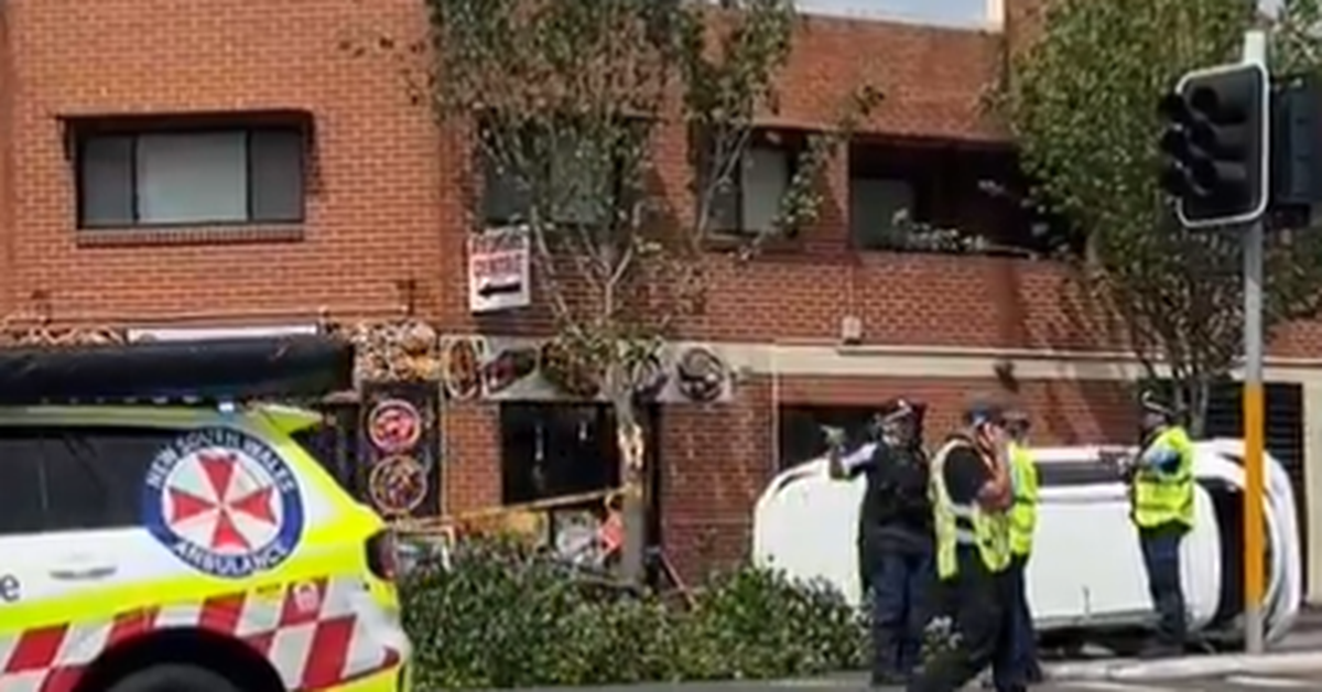 Three pedestrians fight for life after being hit by car outside Indian restaurant in Sydney's west