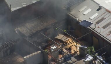 Dozens of firefighters battle blaze at furniture factory in Sydney's west