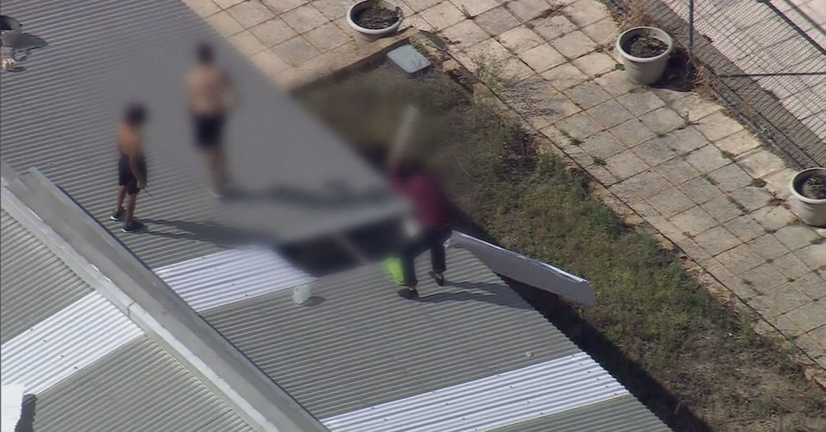Youths removed from detention centre roof after 18-hour stand-off