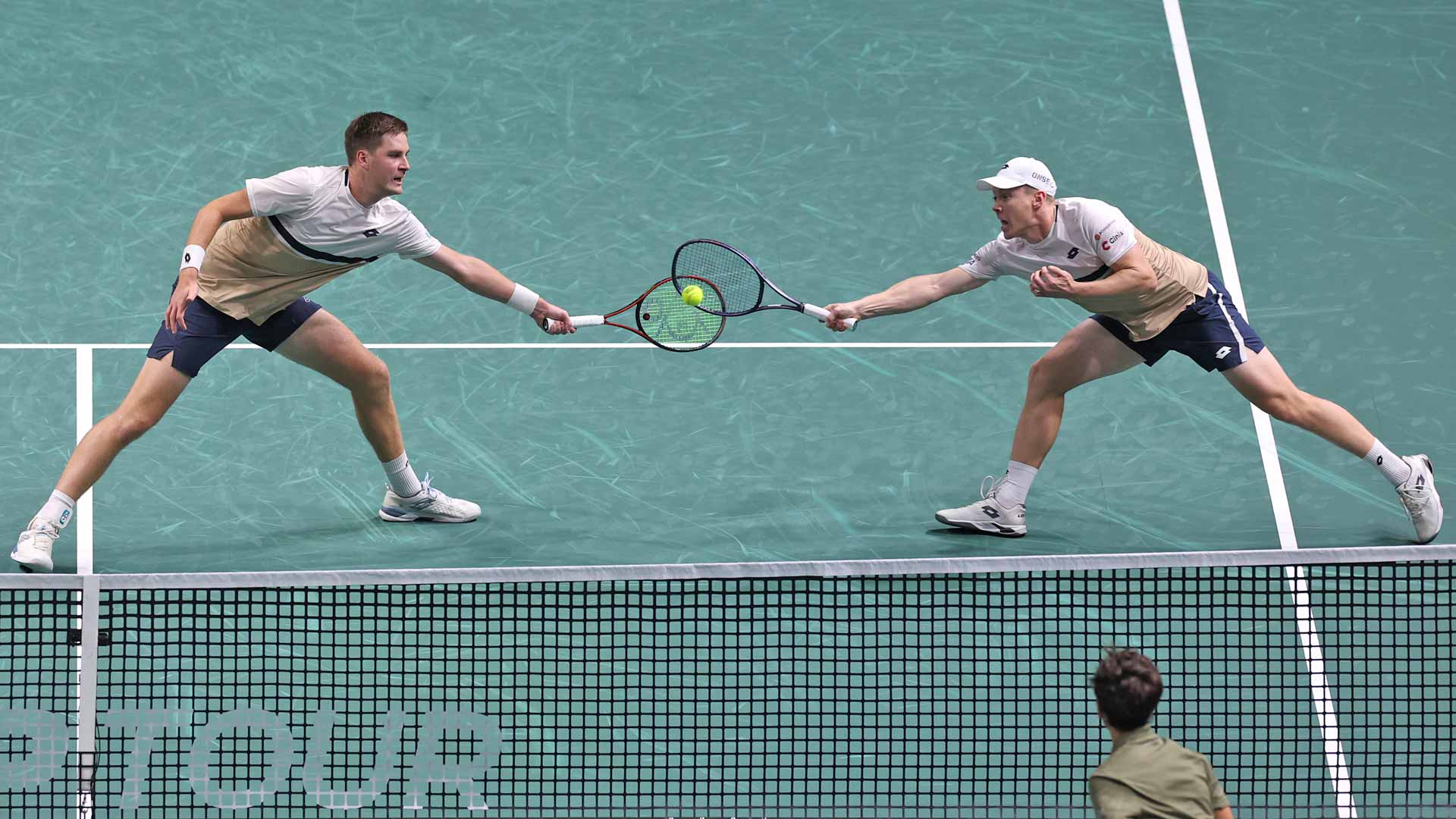 Henry Patten and Harri Heliovaara in action on Saturday during their Rolex Paris Masters semi-final win.