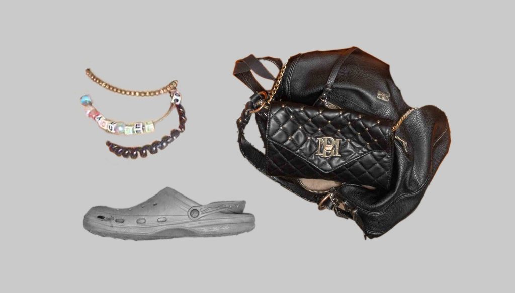 Toronto police released a photo of items belonging to a person who was found dead near Bloor Street West and Spadina Avenue on April 18, 2025