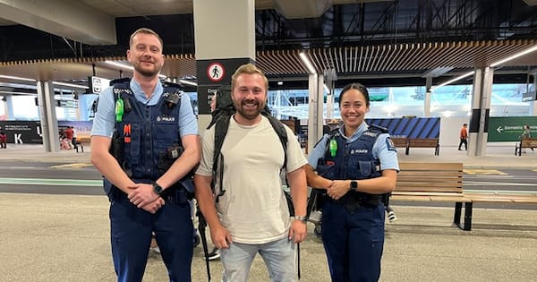 Tourist reunited with stolen belongings at departure gate