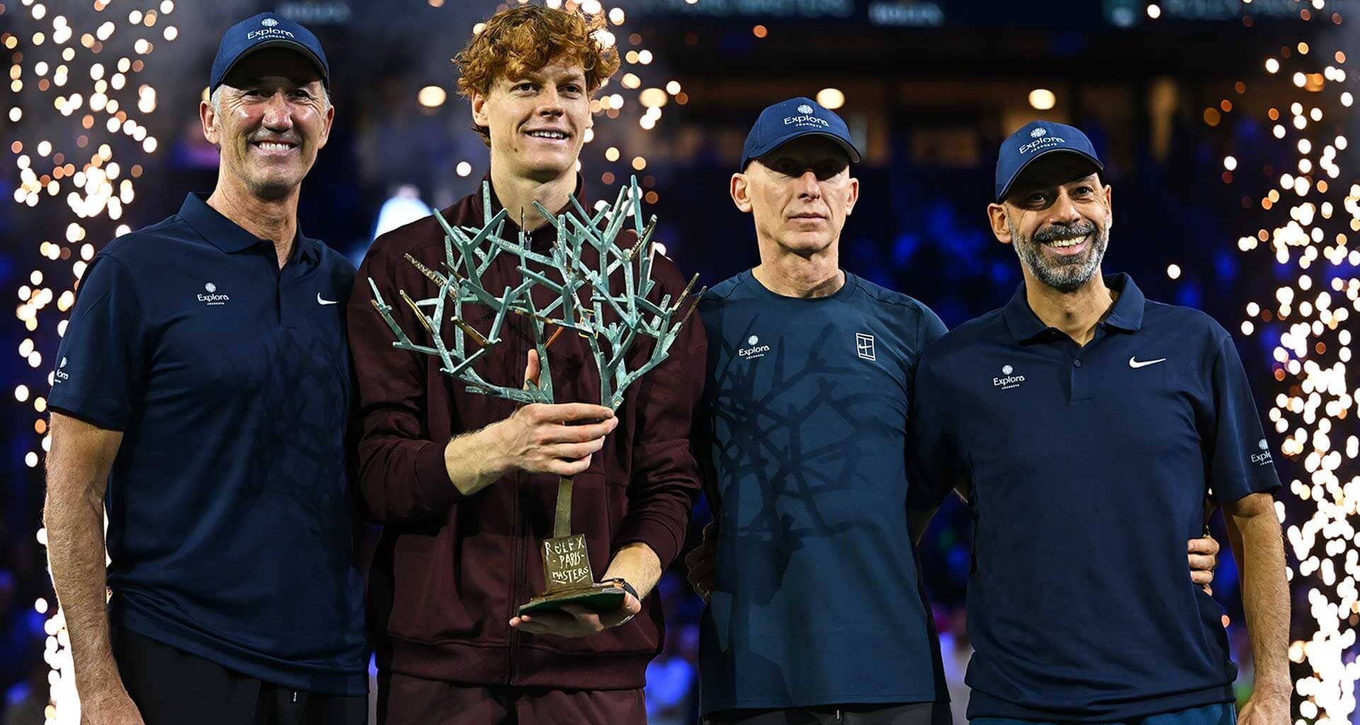 Jannik Sinner celebrates winning Paris with his team.