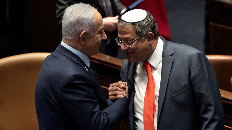 Benjamin Netanyahu and Itamar Ben Gvir shake hands. Pic: Reuters