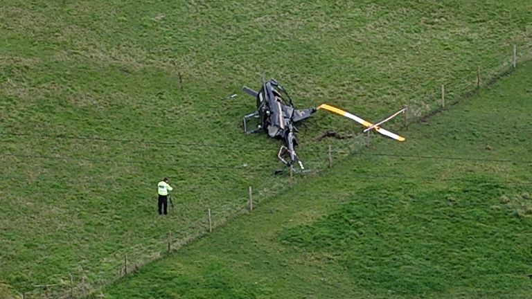 The helicopter could be seen lying on its side in a field. Pics: Yappapp