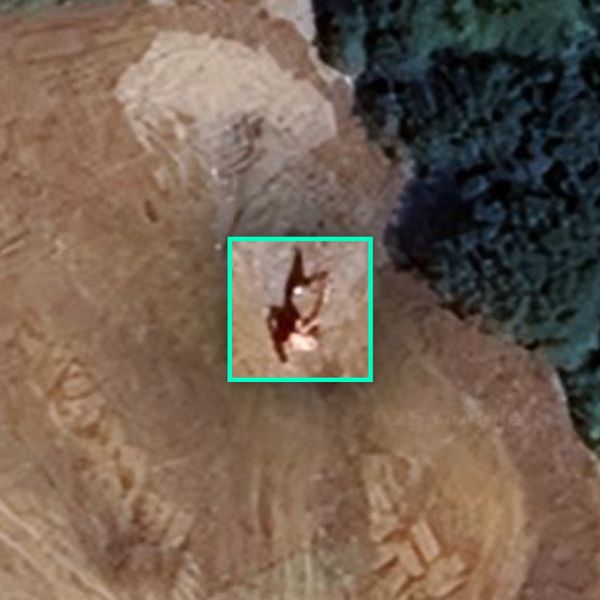 An excavator is visible at the waste site in June this year