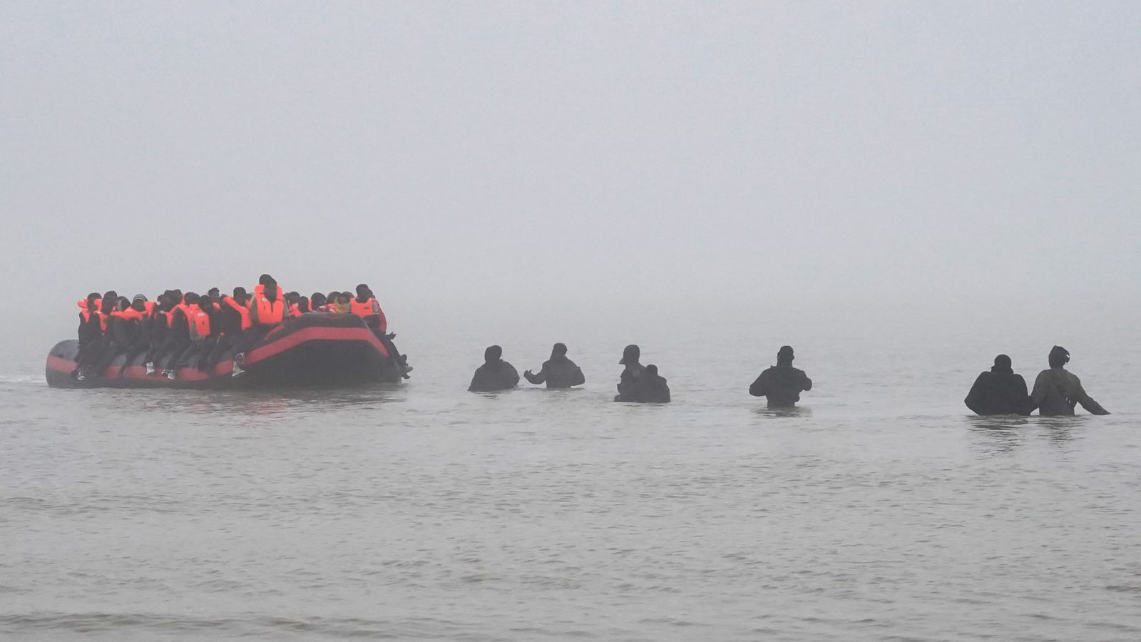 People thought to be migrants board a small boat in Gravelines, France on Friday 7 November. Pic: PA
