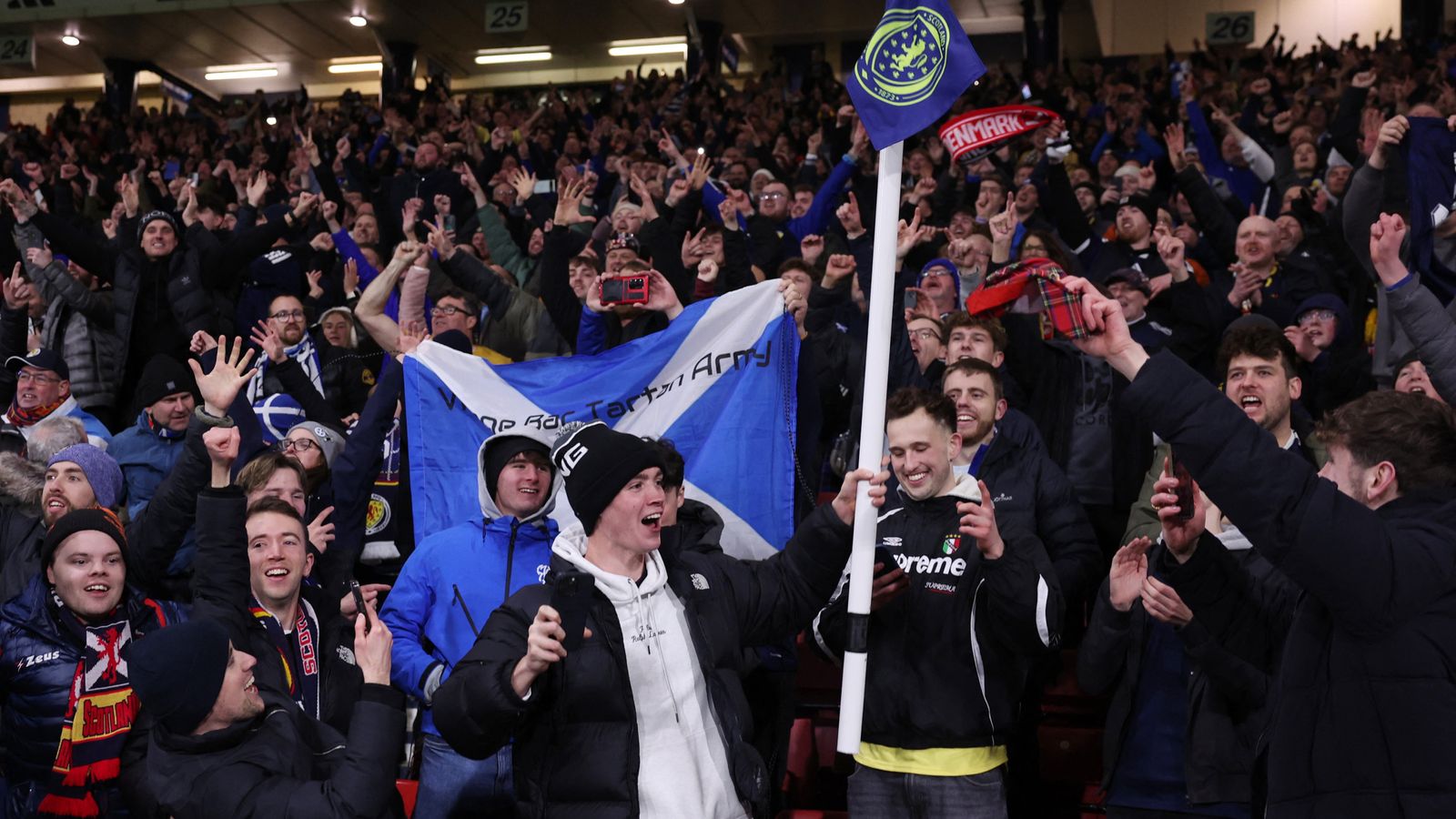 Scotland fans celebrate victory against Denmark. Pic: Reuters