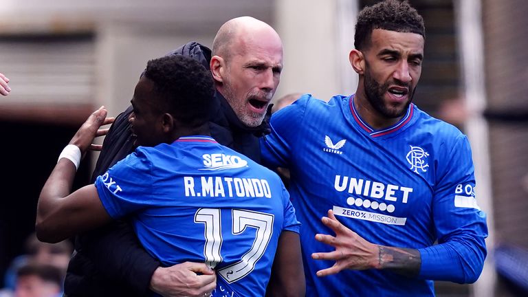 Rangers' Rabbi Matondo celebrates scoring their side's third goal of the game with manager Philippe Clement and team-mate Connor Goldson