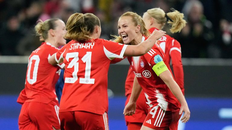 Bayern's Glodis Viggosdottir, right, celebrates after scoring her side's third goal during the women's Champions League opening phase soccer match between FC Bayern Munich and Arsenal FC in Munich, Germany, Wednesday, Nov. 12, 2025. (AP Photo/Matthias Schrader)