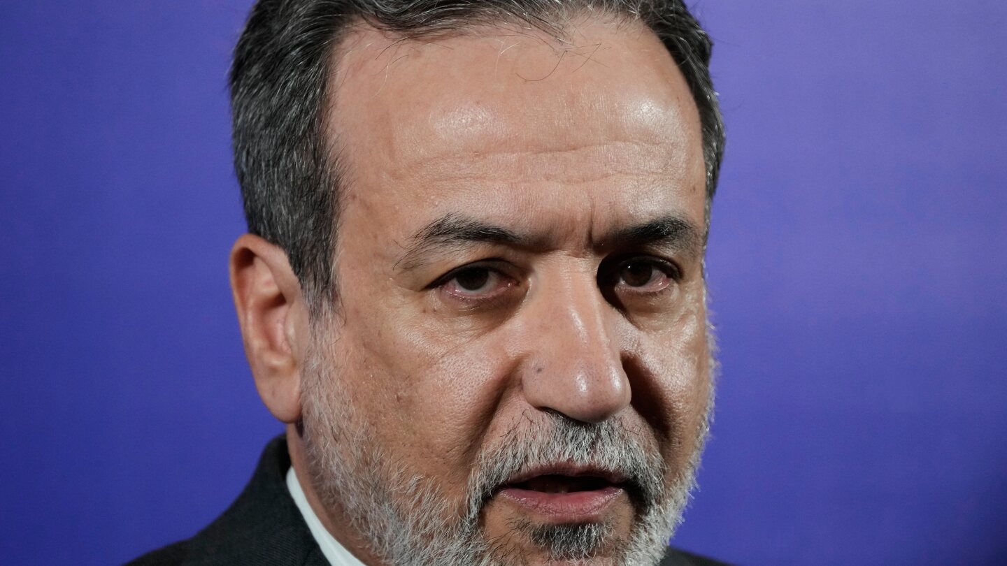 Iran no longer enriching uranium, foreign minister says