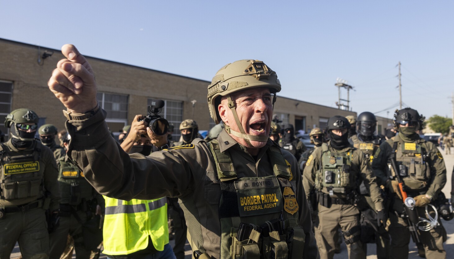 Federal appeals court halts ruling that curbed use of force during immigration campaign