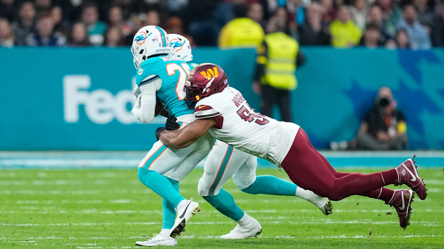 Marcus Mariota throws overtime interception, setting up Dolphins' game-winning field goal