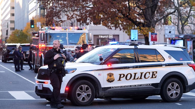 US Marshalls and National Guard troops are seen after reports of two National Guard soldiers shot near the White House in Washington.