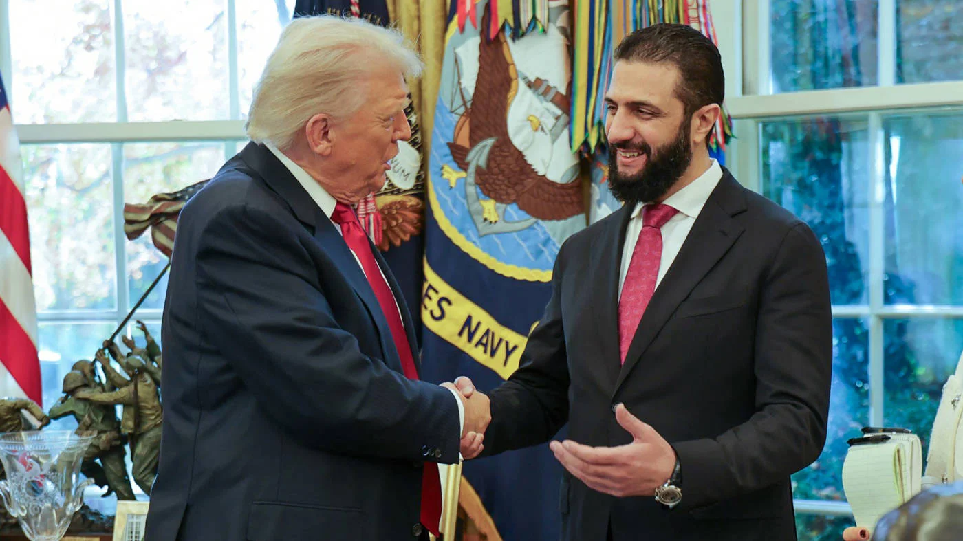  US President Donald Trump (left) with Syria's President Ahmed al-Sharaa at the White House in Washington, on November 10, 2025 (AFP)