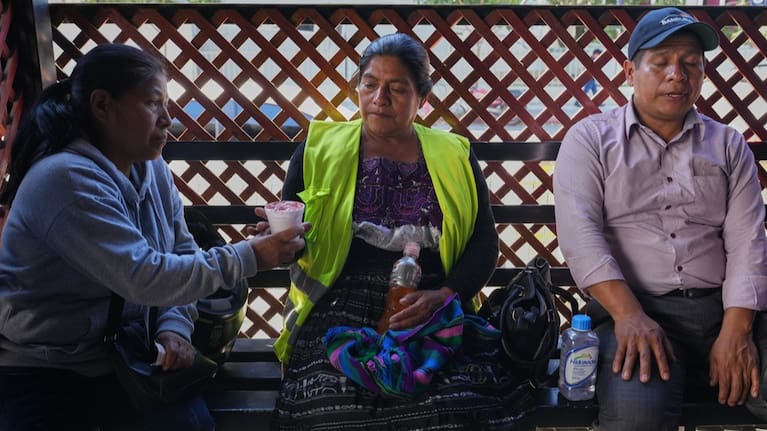 Vilma Pérez, centre, the mother of migrant Maria Florinda Ríos Perez who was killed in Indiana, waits for her body outside La Aurora International Airport in Guatemala City.
