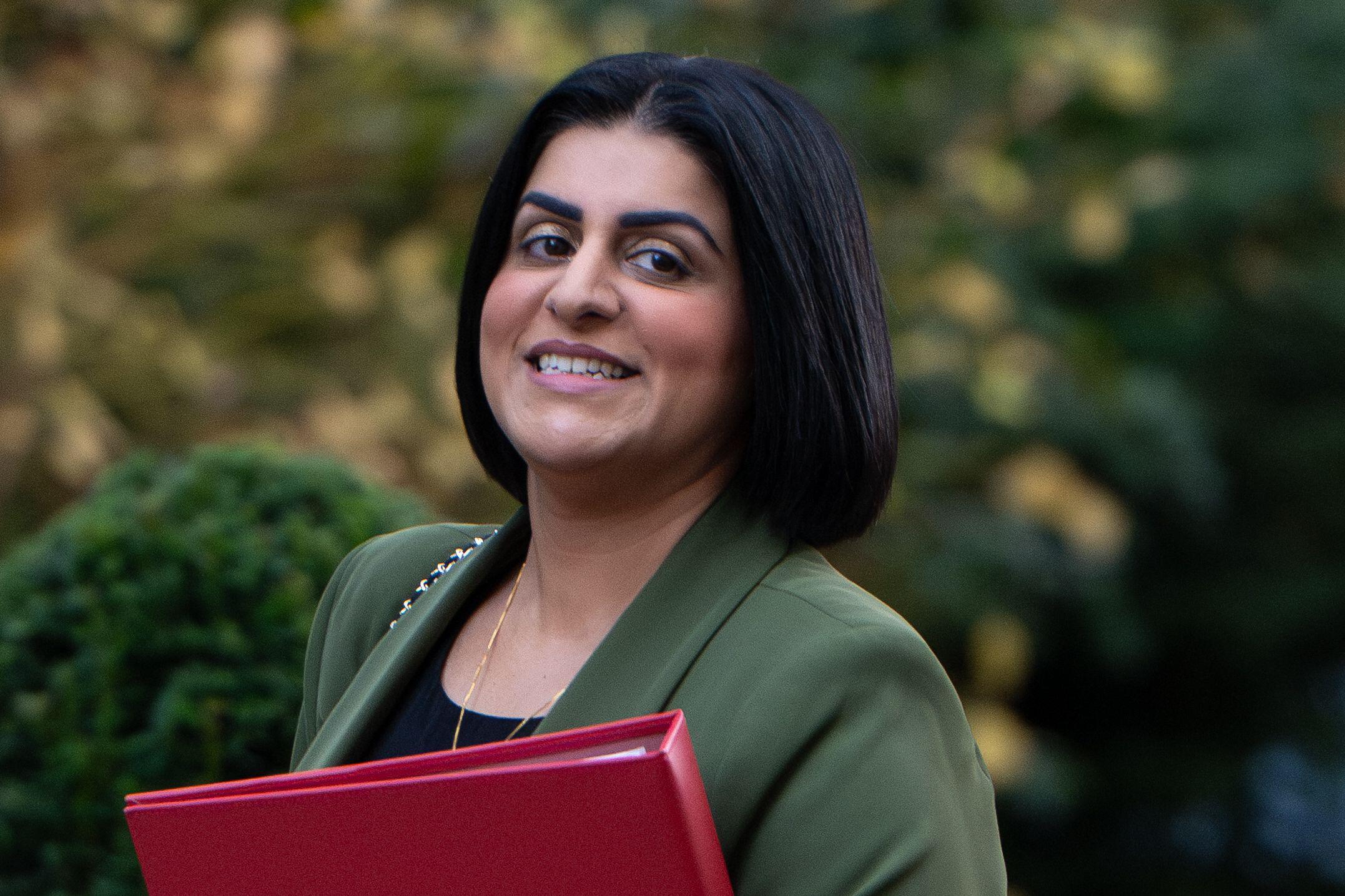 Shabana Mahmood, Home Secretary, smiles while arriving at 10 Downing Street for a Cabinet meeting.