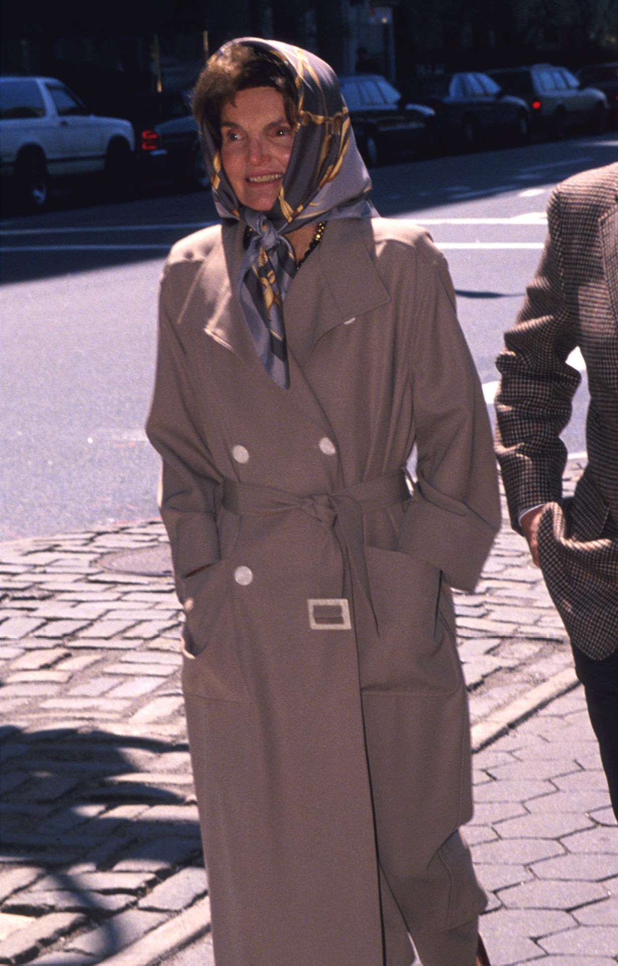 Jacqueline Onassis and Maurice Tempelsman walking through Central Park.