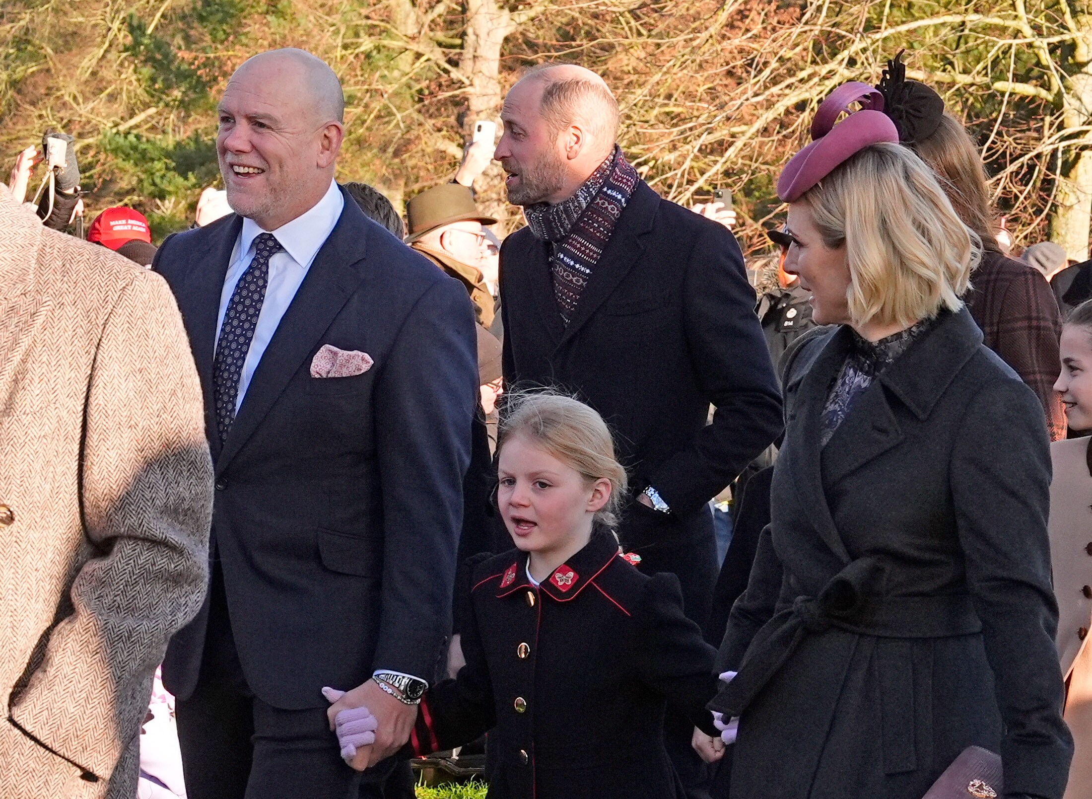 Mike Tindall, Lena Tindall, and Zara Tindall attending a Christmas Day church service.