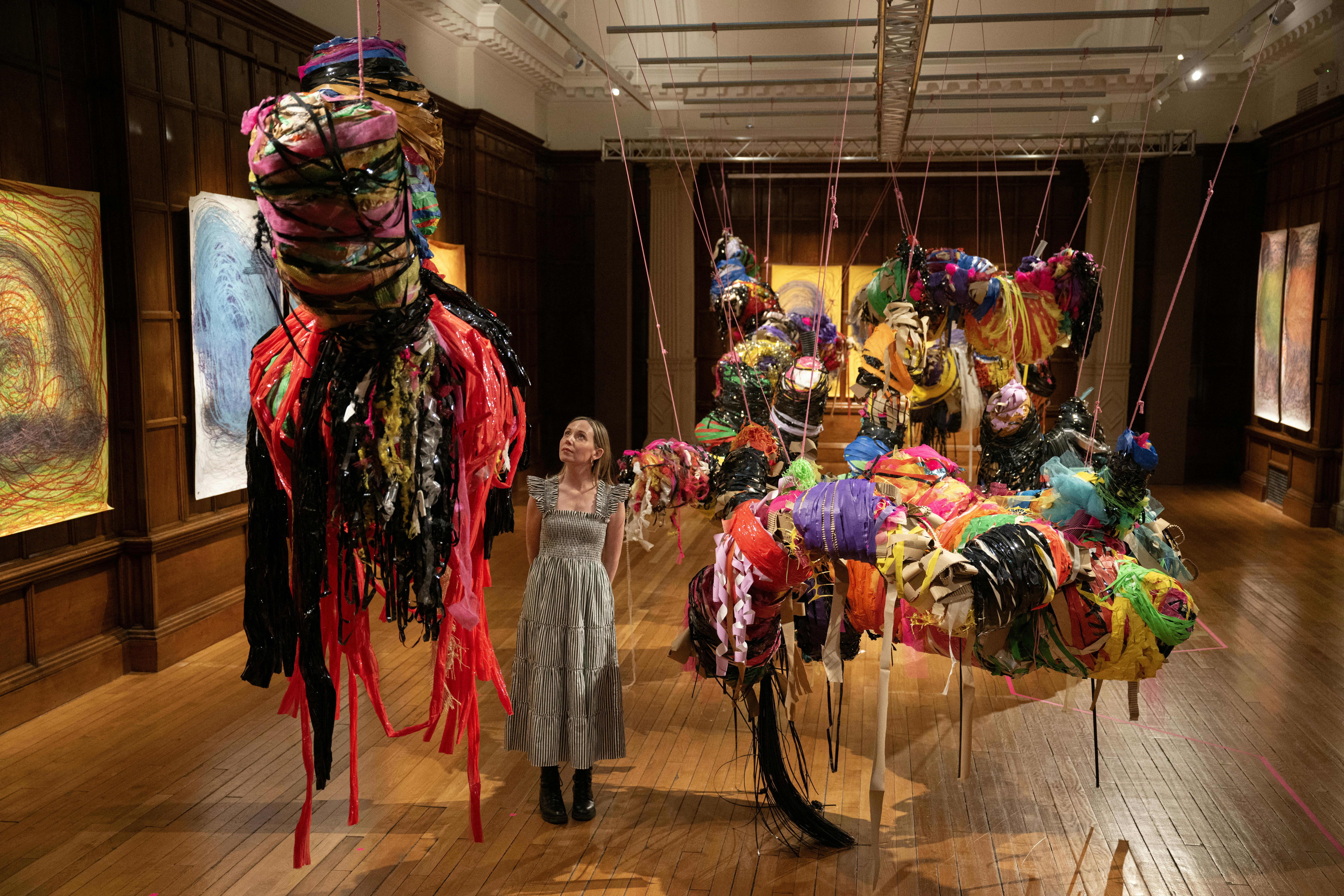 A person poses with the art installation 'Conversations' by artist Nnena Kalu, shortlisted for the Turner Prize.
