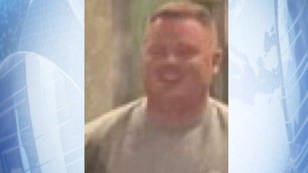 close up of Devon Hennessy on a blue background