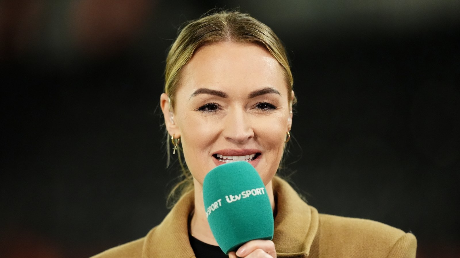 Presenter Woods 'OK' after collapsing live on air