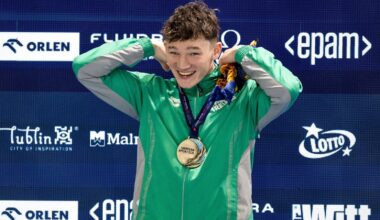 Shortt wins 200m backstroke gold in record time