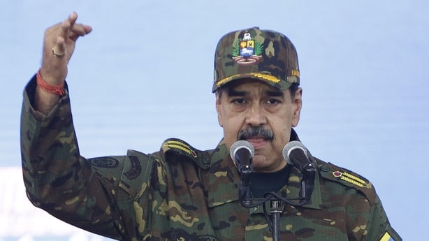 CARACAS, VENEZUELA - NOVEMBER 25: Venezuela's President Nicolas Maduro delivers a speech while holding the Venezuelan independence hero Simon Bolivar's 'Sword of Peru' during a military ceremony in Fuerte Tiuna, Caracas on November 25, 2025. (Photo by Pedro Rances Mattey/Anadolu via Getty Images)