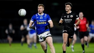 13 December 2025; Kieran Hughes of Scotstown in action against Shealan Johnston of Kilcoo during the AIB Ulster GAA Football Senior Club Championship final match between Kilcoo and Scotstown at BOX-IT Athletic Grounds in Armagh. Photo by Ramsey Cardy/Spor
