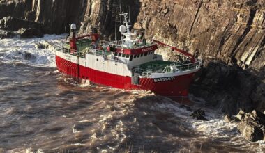 Efforts to board grounded trawler called off for today