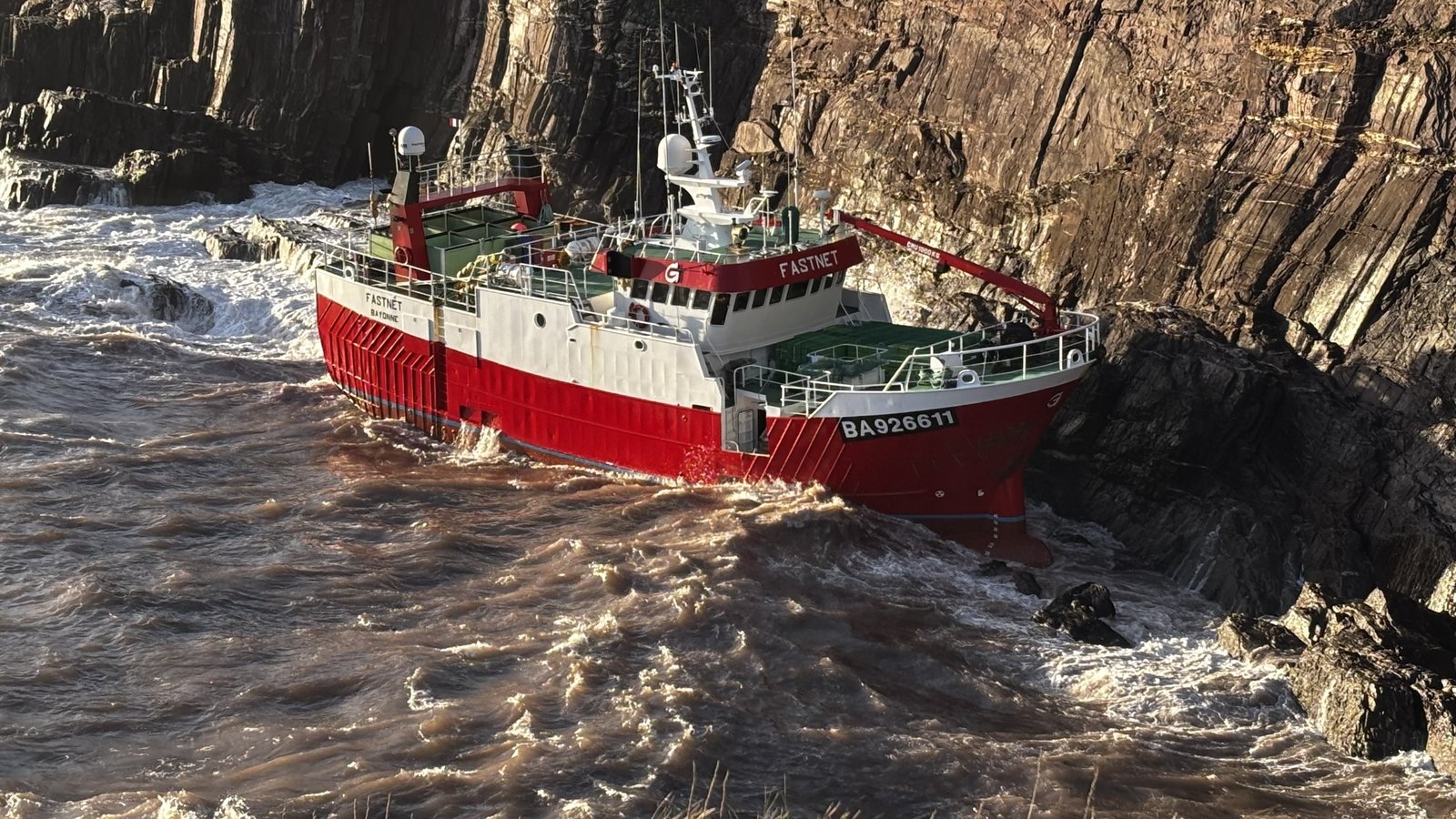 Efforts to board grounded trawler called off for today