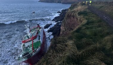 Salvage operators unable to board grounded trawler