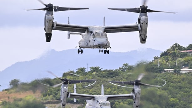 Two US Marine Corps MV-22 Ospreys depart at Mercedita International Airport on December 16, 2025 in Ponce, Puerto Rico. Aircraft movements and coordinated exercises were observed throughout the day as part of heightened regional military readiness linked to ongoing operations at US military bases an
