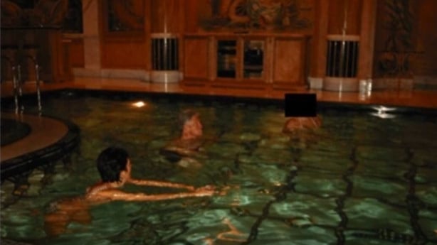 Picture shows Bill Clinton swimming in a pool