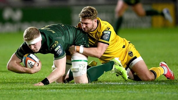 20 December 2025; Sean O'Brien of Connacht is tackled by Angus O'Brien of Dragons during the United Rugby Championship match between Dragons and Connacht at Rodney Parade in Newport, Wales. Photo by Kian Abdullah/Sportsfile