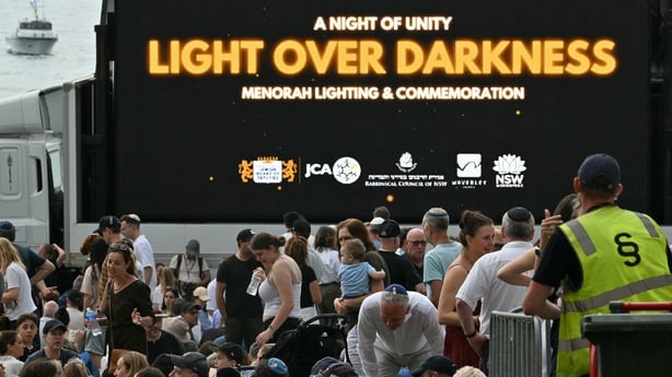 Mourners arrive to attend the memorial held for the victims of a shooting at Bondi Beach