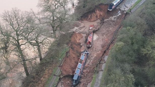 Several boats are seen stranded after a sinkhole opened at the canal in Shropshire