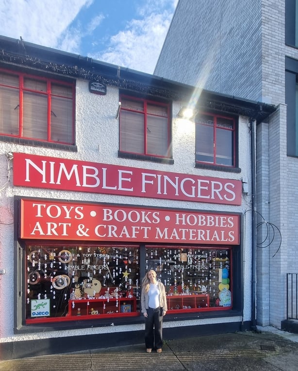 Katherine Staunton from Nimble Fingers in Stillorgan stands outside her store 