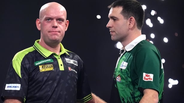 Netherlands' Michael van Gerwen (left) celebrates defeating Ireland's William O'Connor