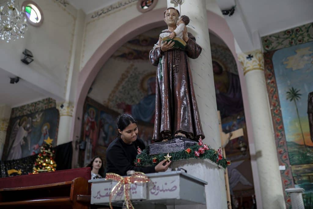 Palestinian Christians decorate the Latin Monastery Church in hardships Gaza City ahead of New Year celebrations, continuing their preparations despite the hardships facing the besieged enclave, on December 9, 2025. (Photo: Omar Ashtawy/APA Images)