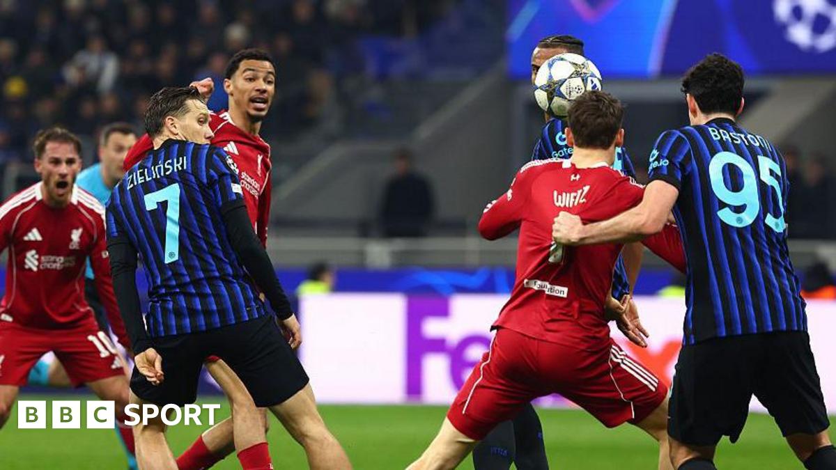 Florian Wirtz, right, has his shirt pulled by Alessandro Bastoni