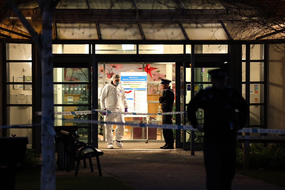 Police at the scene of an incident at Newton Community Hospital in Newton-le-Willows